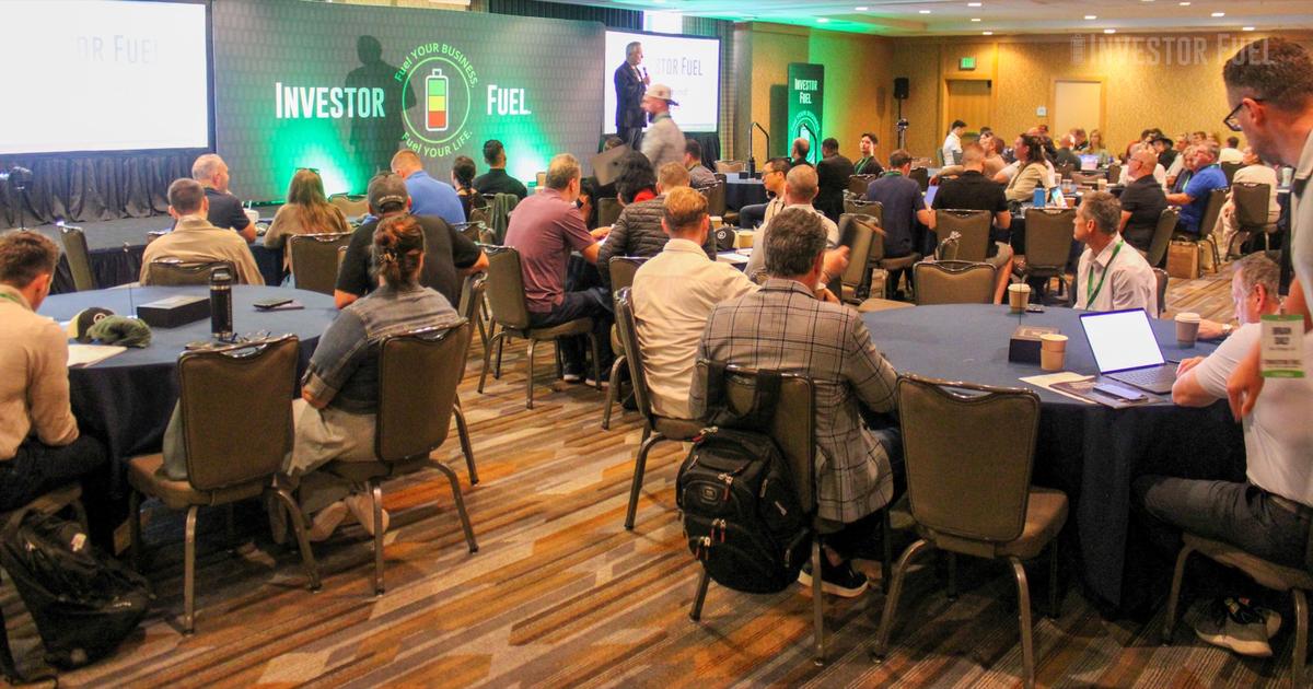 Three members together at an Investor Fuel Mastermind